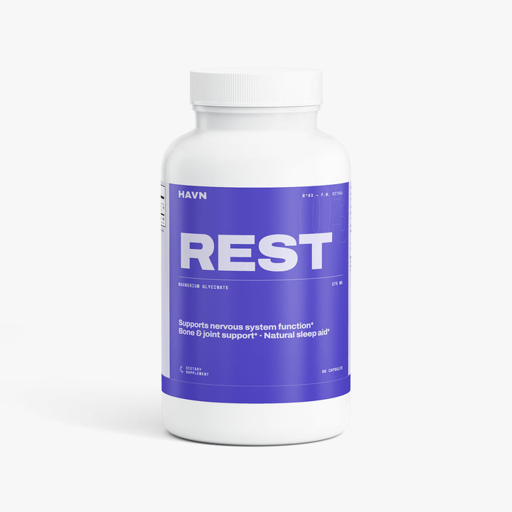 HAVN Rest supplement bottle, front view, indigo label reading REST — Magnesium Glycinate